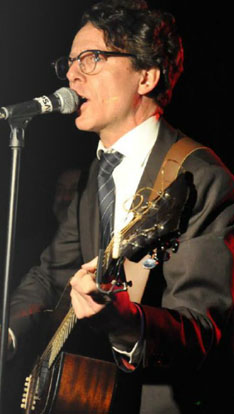 Andrew Cash Andrew Cash On stage or in the House, Cash rocks the tailored suit while channeling the style idols of Rockabilly past. (photo and caption courtesy of Elizabeth Gray-Smith, iPolitics.ca)